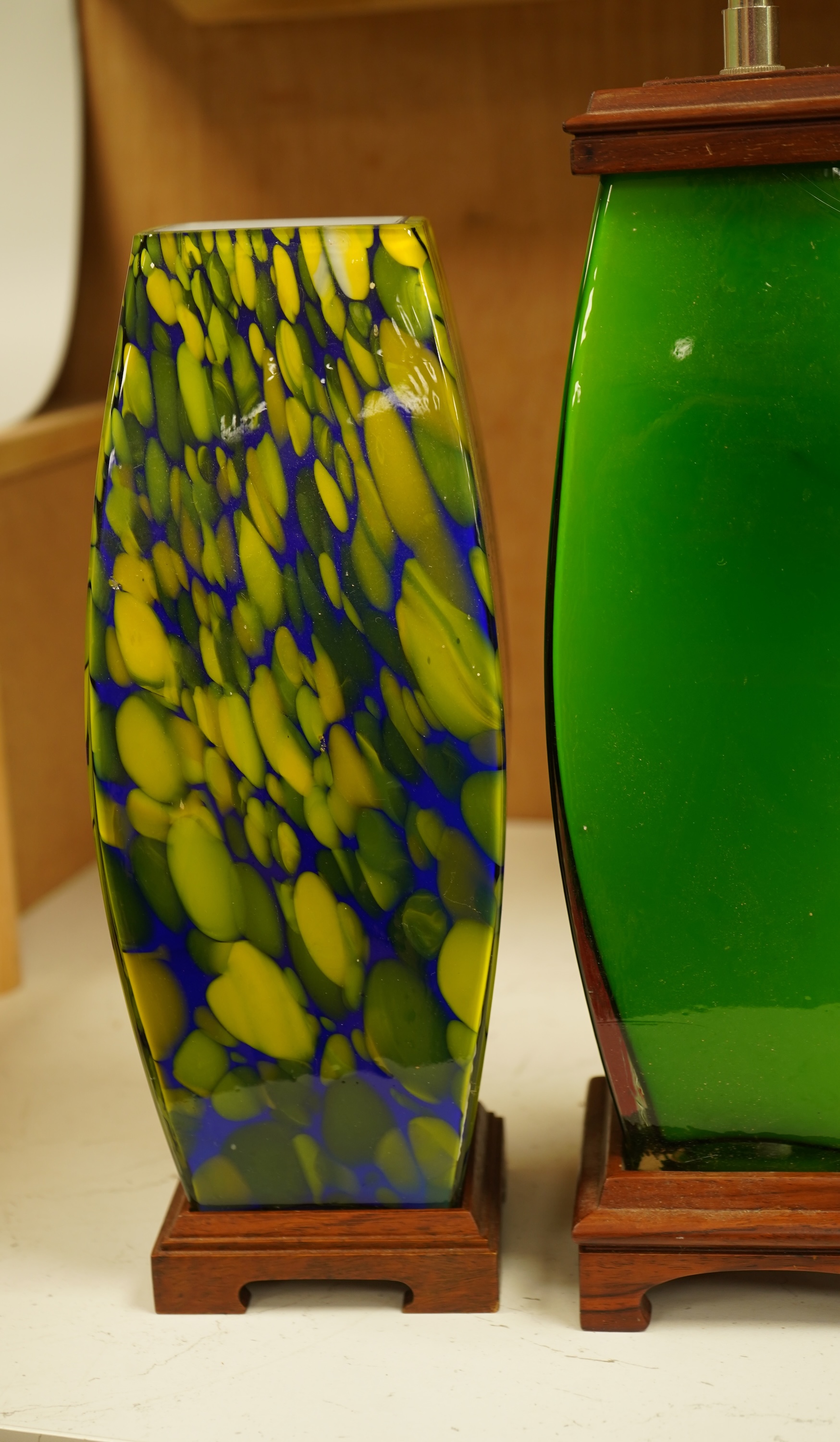 A modernist green glass lamp base another another example, largest 66cm high